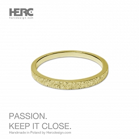 Gold wedding ring with a texture